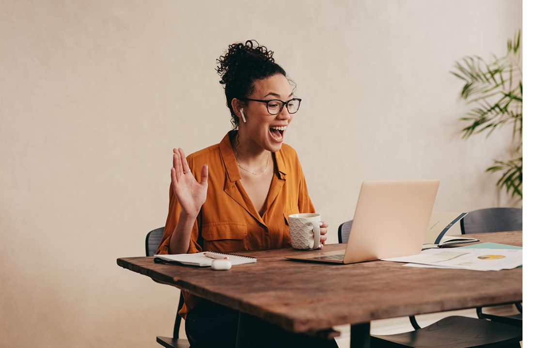A remote worker settled and connected on a video call from home